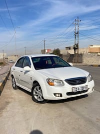 كيا اسبكترا موديل 2008رقم نينوى جديد بيها 5قطع صبغ بدون اي دواخل انطيه...
