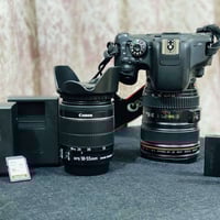 كامره كانون D750 شاشه لمس  شاشه قلاب  عدسات ثنين عدسه 105:24 عدسه 55:1...