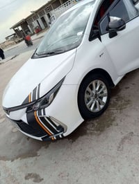 كورلا هايبرد • موديل 24 • طخه بالجنط