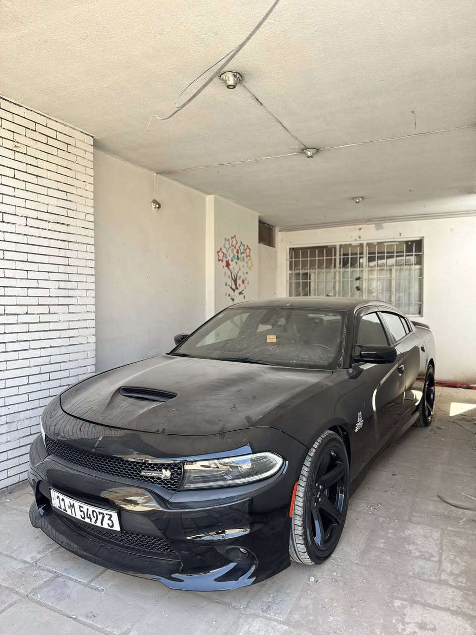 شلونكم حبايبي الوحش للبيع  🖤
دوج جارجر سكات باك . Scat Pack . 
الموديل : 2022 . (وارد امريكي) قطعة واحدة صبغ 
فقط  بنيد بدون دواخل  والسيارة بعدها  بريحة الوكالة 
المحرك : SRT . V8 . 6.4L .
العداد : 28000 mil  . ( بعدها زيرو) .
كفالة  عالبلاد بوضع الوكالة حتة حجر البيئة بيها 
المواصفات :  فول عدا الفتحة                                 
* رادار امامي مع مانع تصادم . 
*  نقطة عمياء . 
* مكابح رياضية (برمبو) . 
* لايت LED . 
* كزوز سستم بلاد  . 
* حساسات خلفية . 
* ويل قياس 20 أنج 
* سستم صوت ALPINE . 
* تشغيل عن بعد . 
* مقاعد رياضية  حضن  جلد   . 
* ذاكرة لحفظ وضعيات الجلوس (ميموري) . 
* المقاعد الأمامية تبريد وتدفئة
* شاشة كبيرة قياس 8.4 أنج اوپشنات SRT 
* تدفئة ستيرن . 
* كير شفت  بالستيرن . 
رقم بغداد مشروع وطني  باسمي تحويل ثاني يوم ورايدها ب 240   ورقة  مكانها بزيونه  وهذا  رقمي  *********** سجاد ، واتمنى الميعرف بسعرها يترك كلمة طيبة 🖤
