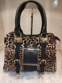 حقائب جلد أصلي • كماليات سندريلا • طوز خورماتو