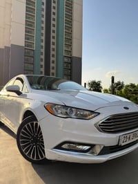 Ford Fusion 2017 S ‎گیر و مەکینە:  مەرغوب 2.5 ‎ڕەنگ: سپی بەفری ‎بێ ئێر...