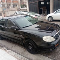 دايو لكنزا 2001 كير توماتيك محرك وكير شرط تبريد وتدفئه شغال باتري وارب...