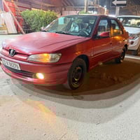 بيجو فرنسي موديل 2002سياره مكفوله من ضربه وتبديل وصبغ كير ومكينه مكفول...