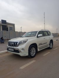 برادو 2015   VX  ساز  اصل  مكينه 4000  6 سلندر   كراسي كهرباء فول تحكم...