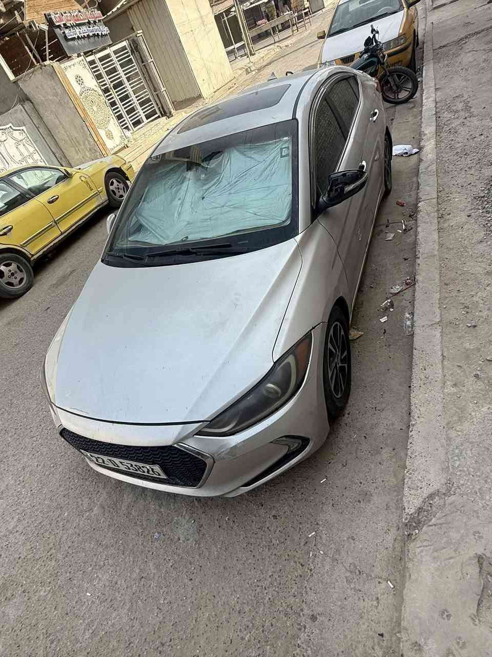 السلام وعليكم 
هيونداي النترا فول مواصفات  موديل 17 رقم أربيل بسمي هزة و سنوية جديدة تحويل او وكالة مباشر 
فول مواصفات للأخير 
✔️ فتحة سقف  
✔️ شاشة كبيرة كار بلي + كامرة  
✔️ بصمة تشغيل  + أبواب 
✔️ تحكم ستيرن
✔️ لايتات زنون 
✔️ مرايا كهرباء  
كير محرك كفالة جديدات عليها إدامة جديدة
تبريد منظومة جديدة فريز و كمبريسر و راديترات جديدة تبريد على البصمة 
المازدات جبتلهن جامات جديدة بس ماعندي مجال ابدلهن 
بيها جاملغ السايق و البنيد صبغ و كم مكان صبغ بدون تبديل او شاصي 
مكاني بغداد 
السعر 94 وبيها مجال 
 متواجد خاص الاتصال ***********
