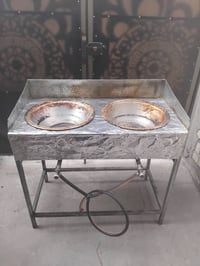 من رخصة الادمن المحترام عندي طباخ مزدوج اخو الجديد للبيع السعر ١٢٥ بغد...