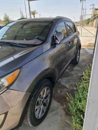 كيا سبورتج 2015  وارد امريكي ضربتهة تبديل بدنه وبنيد رقم ذي قار سعر 12...