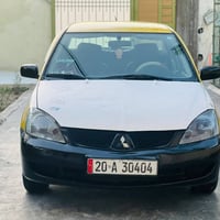 لانسر ٢٠١٠ • ١٦٠٠ • رقم ديالى