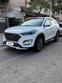 توسان مديل ٢٠ رقم بغداد  مكفوله  مواصفاتها - بصمه - خمس عدسات - كشنين ...