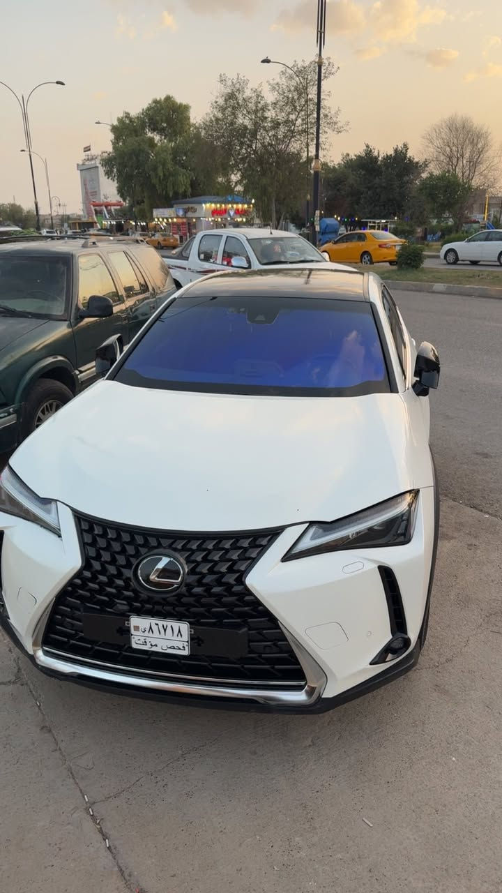 LEXUS UX250h 2023 🤍 
� السيارة موجودة بـ كركوك
📞*********** 
 السيارة مفحوصة وموجوده الضرر مالتها كامل بالتقرير 
ملاحضة الاباب رش لتوحيد اللون 
وسيارة رقم كركوم ومرقمة باسمي
