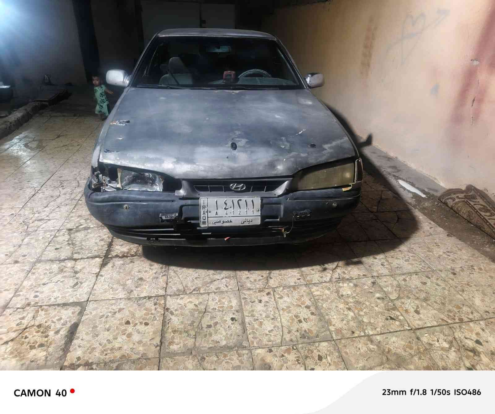 سيارة سوناتا موديل ٩٢ أبيع كوم حديد لأن صاحبهه ميت مكينه وكير مكفولات تخم تاير سيارة شغاله كلشي ما بيهه رقم وسنويه بس صاحبهه ميت وأنطيك رقم أبنه وأنته ويا للإستفسار الاتصال *********** المكان بغداد
