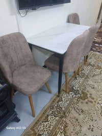 ميز طعام مرمر • ٤ كراسي • حي الضباط