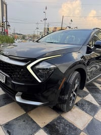 سبورتج موديل 2023 السياره ماشيه 42 هايبرد حادثها باب الصندوق شي بسيط و...