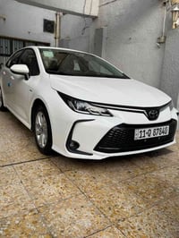 كورلا هايبرد ♻️ سعر ١٤٩  موديل 2024  ممشى السيارة 26.000 الف فقط  مواص...