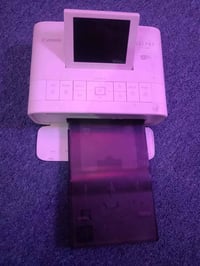 طابعة صور كانون سلفي 1300  السعر 150 نضيفه جداً نضيفه للأتصال 07713024...