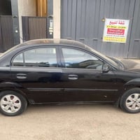 كيا ريو 2011 خليجي محرك 1400 كير اوتو مضيفات تبريد شغال باسمي بغداد مك...