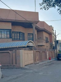 مصرف الفاروق • ٢٠٠م • شارع عريض