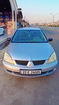 لانسر ٢٠٠٩ • رقم اربيل • ضربة سائق امامي