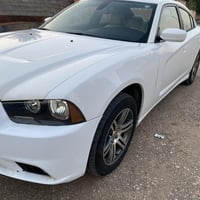 جارجر 2013 وارد كندي 🇨🇦 فقط باب السايق تبديل اصلي نفس اللون  رقم اربيل...