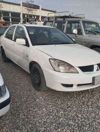 لانسر ٢٠١١ • فرامل ABS • كالار