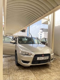متسوبيشي لانسر قرش موديل 2009 السياره كير مكينه بشرط تنساهن والتبريد ش...