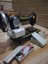 مكينة خياطة • جديدة • باكيتها