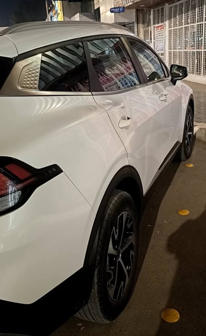 #سبورتج  هايبرد|KIA Sportage
- موديل 2023  
مرقم بغداد شبه مميز 57155
  مواصفات 
فور ويل  4x4
 محرك 1.6 لتر توربو هايبرد بقوه240 حصان (اقوى من جميع اصدارات سبورج واكثرهن اقتصاديه وعمليه)
 ‏تمشي بتفويله وحده 950km
 ‏#العداد 45 الف mi 
 ‏#حادث_السيارة بنيد وجاملغ
صبغ بنيد بدون اي تبديل 
ليبل واحد
 ‏#اللوحات بغداد شبه مميزة
 ‏#اللون ابيض
كير ماوس اوتيماتك 8 سرعات
تشغيل ذكي ( بصمة ) ,تشغيل عن بعد
شاشة Apple CarPlay, android auto 
تحكم ستيرين كامل مع تدفئه 
هاند بريك كهرباء
 شاشة كبيرة ( GPS )
 رادارات 360 
حساس خلفي
 
شاحن وايرليس
كرسي كهرباء 
تدفئة المقاعد الامامية
تدفئه مقود 
صندوق كهرباء
 هاند بريك كهرباء 
 مانع انزلاق 
 اوتو هولد ( AUTO HOLD )
 مساعد نزول المنحدرات 
 سستم صوت مميز
 ‏انظمه قيادة متعدده
 ‏نظام قيادة ذاتي
 ‏كشنات جلد فاخر طبيعي
 ‏منافذ USB +أواكس
للستفسار ***********
