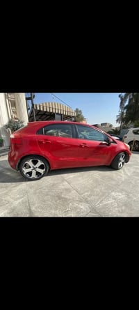 كيا ريو 2015 خليجي  رقم بغداد انكليزي بسمي مكينه 1600 دوش قطرتين جاهزه...