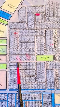 قطعة أرض اللبيع مساحة 300م على شارع 15 يم المدرسه صينيه تريد 100م او ٢...