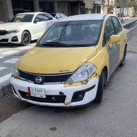 نيسان فيرسا 2008 رقم نجف مشروع وطني  تحويل بشرط مكينة 2000 جديدة ..تخم...