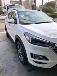 توسان 19 خليجي رقم بغداد مكفوله من البارد والصبغ  ماشيه 51 مواصفات فول...