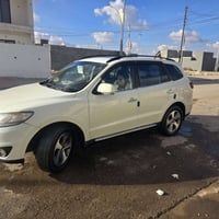 سنتافي 2010 محدثة 2012 بالكامل. المحرك والكير بحالة ممتازة. السيارة مح...