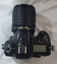 كامره نيكون D7100 • بطاريه • كارتون الكامره