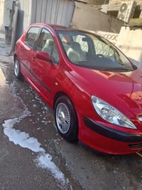 عندي بيجو 307موديل 2005سياره نضيفه رقم بغداد وجاهزه   لتفاصيل أكثر توا...