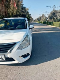 نيساني سني موديل 2018 ماشيه 120 الف رقم بغداد بيها فقط نص بنيد صبغ وال...