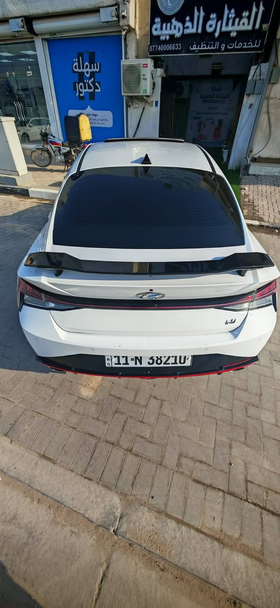 السلام عليكم ورحمة الله وبركاته
للبيع او للمراوس هيونداي النترا N 
 اللون : أبيض 
 كير اوتوماتيك دبل كلج 8 نمر (DCT)
 موديل : 2023
 المحرك : 2000 تيربو
 الممشى : 49 ألف كم 
 تفاصيل الحالة:
 حادث خلفي فقط موضح بالصور بالإضافة 
 للصفحة اليسرى مرشوشة كلير بأمريكا فقط
 صفر ايرباك
 لا يوجد أي حادث أمامي
 السيارة مكانة بالبصرة (حرة)
 رقم بغداد الدولي 
 مكان السيارة بالبصرة (تحويل ثاني يوم)
 التايرات والحدادية وضع الشركة (بالكرتون)
━━━━━━━━━━━━━━━
مواصفات السيارة الكاملة #N 
 أداء رياضي صاروخي لعشاق السرعة والقوة
 سرعة السيارة 300 كم/ س
 تسارع مرعب واستجابة فورية مع دبل كلج 8 سرعات
 كشن حضن
 كشن شعار N
 كشنات كنتارة وجلد N
 سلايد روف
 سقف أسود
 إنارة داخلية 24 لون
 تحكم ستيرن (Normal / Sport)
 تحكم دبلات (Normal / Sport)
دخول ذكي للأبواب 
 بصمة تشغيل
 تشغيل عن بُعد
 شحن وايرلس
 شاشة كبيرة نظام مع نظام ال N
 كاميرا خلفية
 نظام صوت BOSS
 إشارة ترحيب
 إشارات بالمرايا
 اوتو ستوب
 نقطة عمياء
 تحديد سرعة
 تحديد مسار
 رادار أمامي
 رادار جانبي
 رادار خلفي
 حساسات جانبية وخلفية
 أنظمة القيادة:
 NORMAL
 SPORT
 N MODE
━━━━━━━━━━━━━━━
 السعر : 175 ورقة وبيه مجال 
 للتواصل :  ***********
