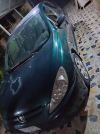 بيجو للبيع فقط  موديل 2005   باسمي رقم إنكليزي  بدون صبغ  العنوان بغدا...
