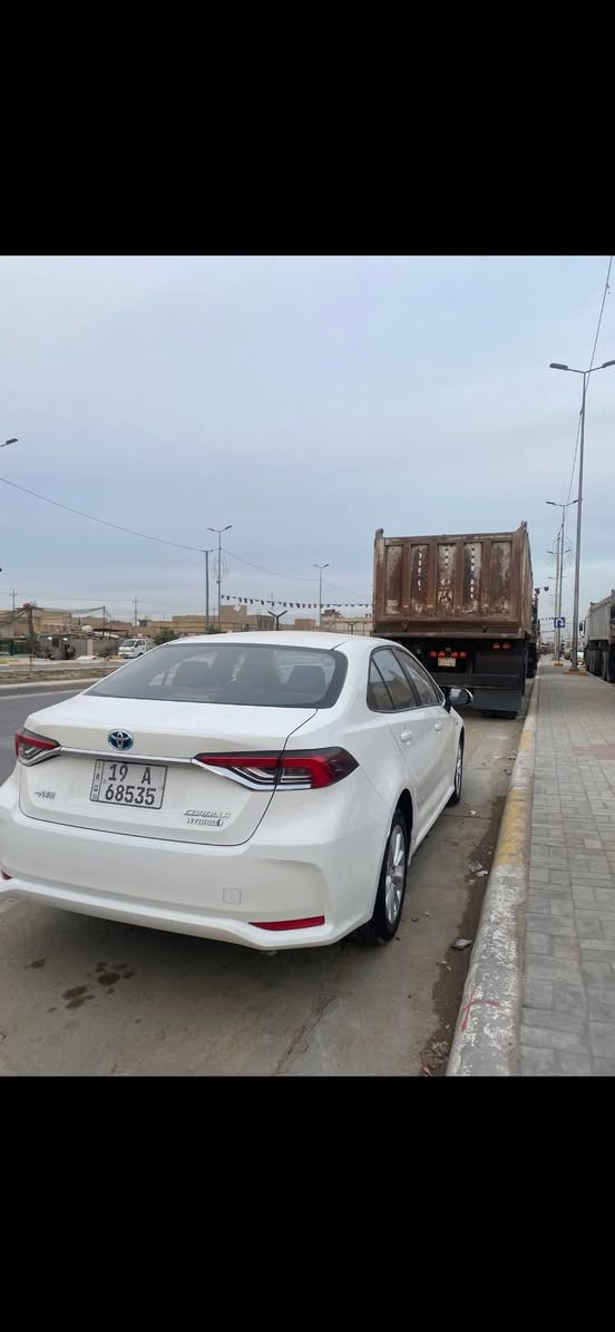 السلام عليكم كورولا موديل 2022 هايبرد للبيع  فول مواصفات مكفولة كفالة عامة ماشية 24 الف 
بصمة + فتحة + رادار + توقف ذاتي +تحكمات ستيرن+تبريد قطعتين +نضام اوتو هولد + سايد بريك كهرباء + داخل جلد لونين + ويل كب
السيارة مكانها كربلاء حي العامل السعر 148 بيها مجال
استفسار ***********
