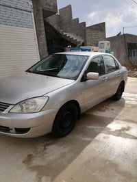 لانسر • ٢٠١١ • أوتوماتيك