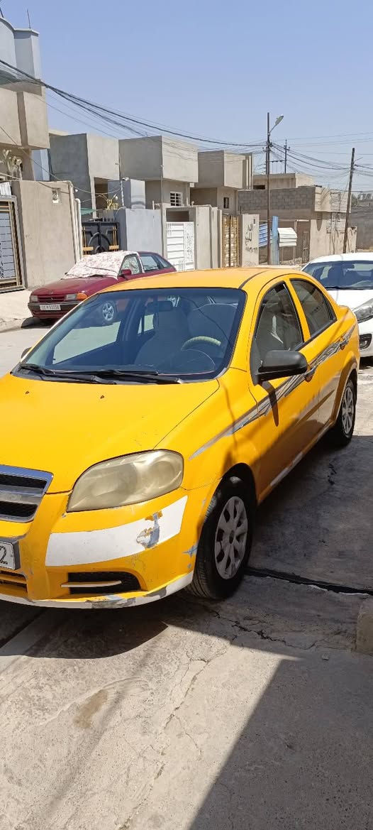 السلام عليكم  سيارة افيو 2009 كم شفتين محرك كير شرط  طخم تاير جديد باتري جديد تبريد وي السويج هيه غرمات صفر بيه طخه بل جاملق الخلفي الايمين راعيه الشرعي اني سعر 55 بيه مجال الرقم ***********    الموصل  جانب  الايمن
