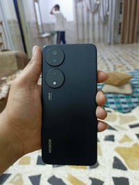 هونر X7b • ٢٥٦ • بدل بايفون ١١