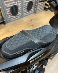 دوشمه وتغليف كافه انواع الدراجات هاتف ٠٧٧٠٥٣٣٤٧٢٩