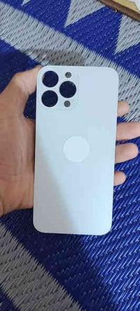 ضهر ايفون 13 برو ماكس  65 قطعة اكثريته لون ابيض للبيع اعلى سعر ابيع 07...