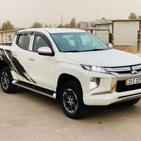 ميتسوبيشي L200 • بنزين • ٩١٠٠٠ كم