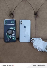 ايفون اكس • بطارية ٩٠ • سماعات معطلة