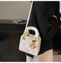 شنطة ديور • نسائية • أسود أبيض وردي