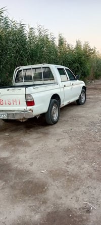 بكم ميتسوبيشي رقم موديل 2002 رقم انجليزي بغداد عنوان بغداد07728921574