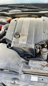 دكمتين • مكينة وكير كفالة • انكليزي