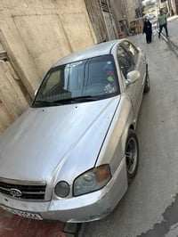 اوبتيما • ٢٠٠٤ • مكينه ٢٠٠٠